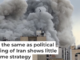 A plume of smoke rises after a strike in Tehran on March 2, 2026. AP Photo/Mohsen Ganji
